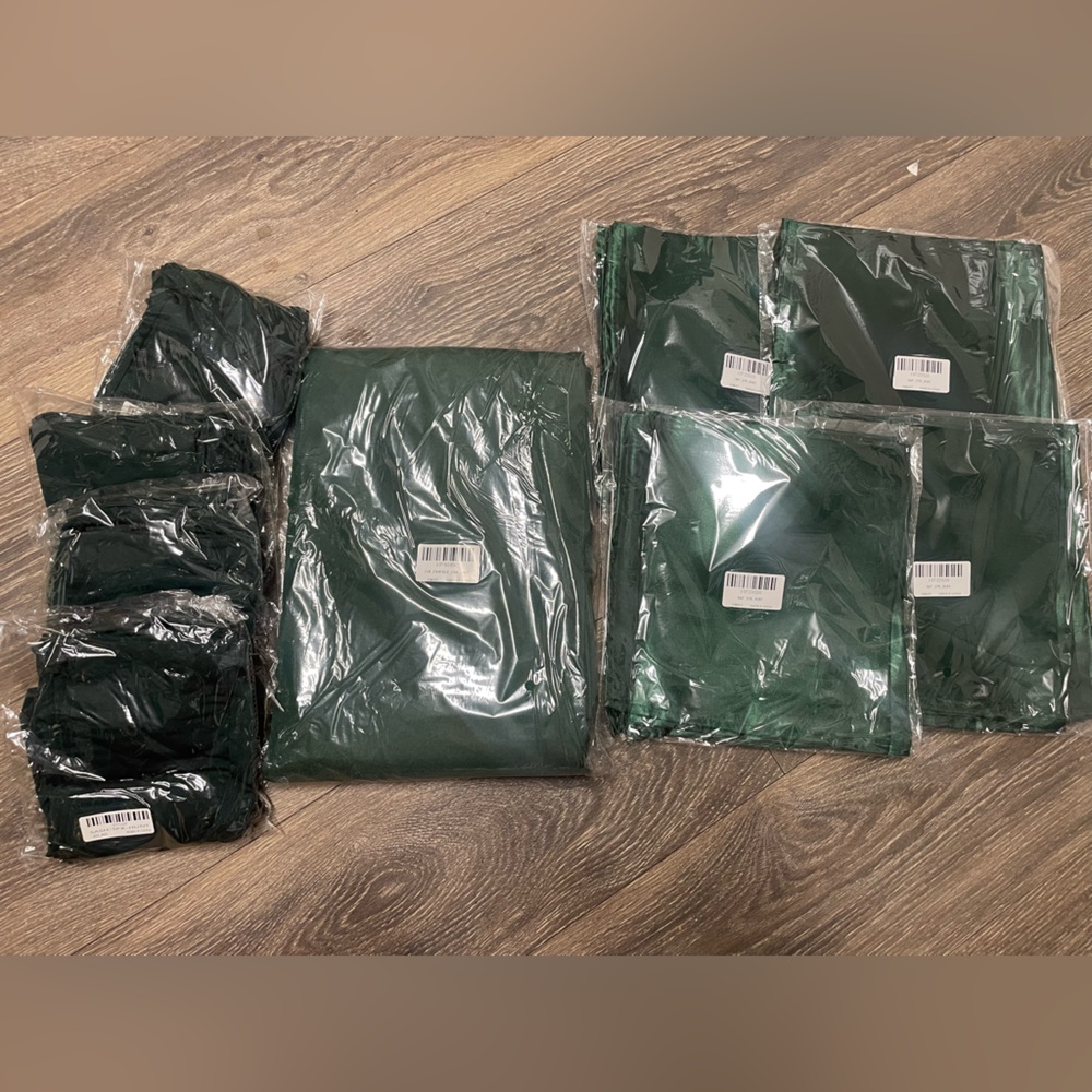 New green table cloths, satin cloth napkins, sashes party essentials